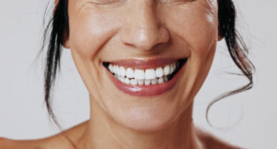 Close-up of a patient smiling after treatment at Batavia Family Dental